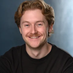 Headshot of Voice Over Artist Elliot Hardman at JB Voices