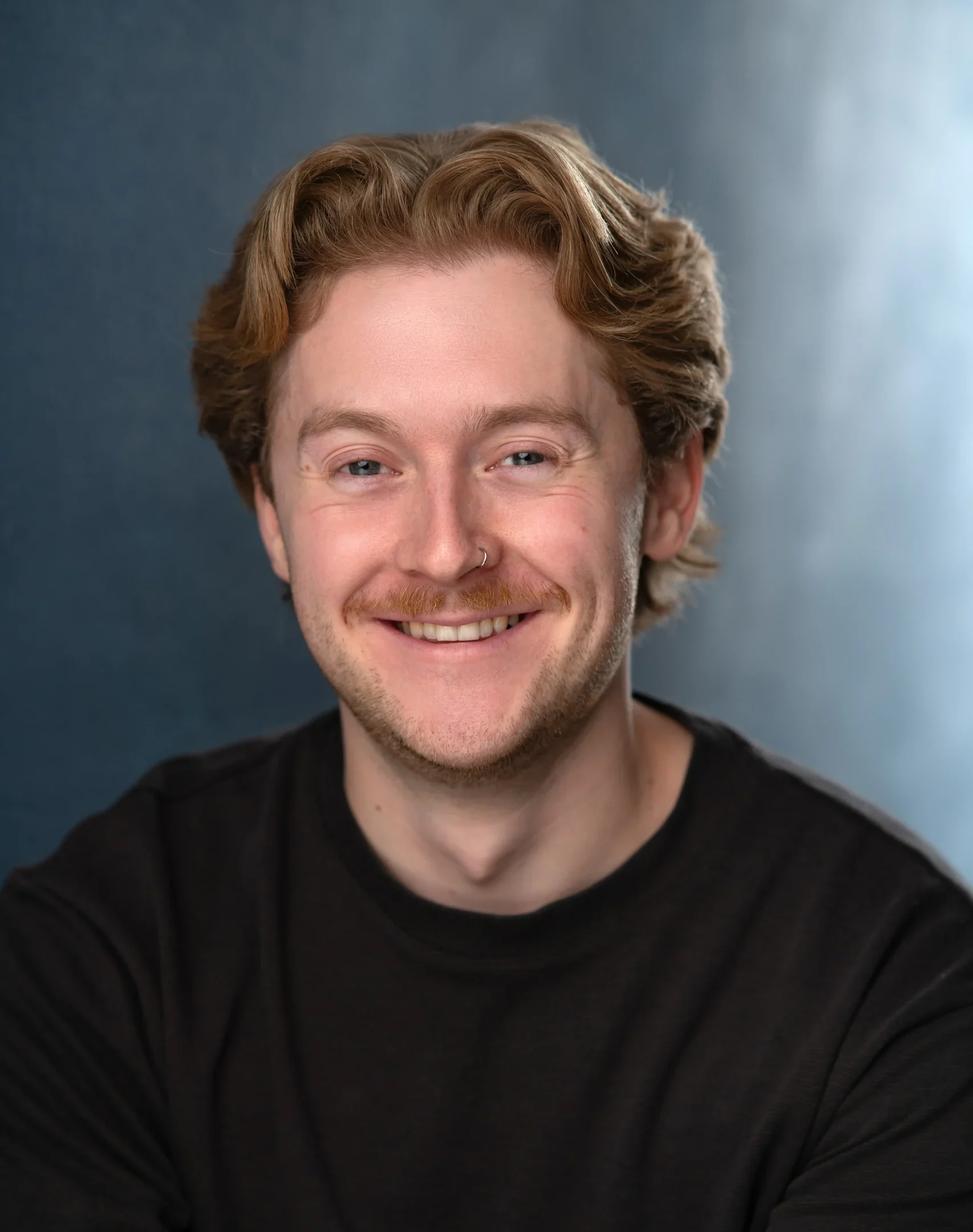 Headshot of Voice Over Artist Elliot Hardman at JB Voices